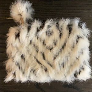 Furry zebra pattern clutch. NEVER USED!